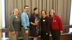 Representatives of the Wellesley Free Library accepting the Stronger Together Award.